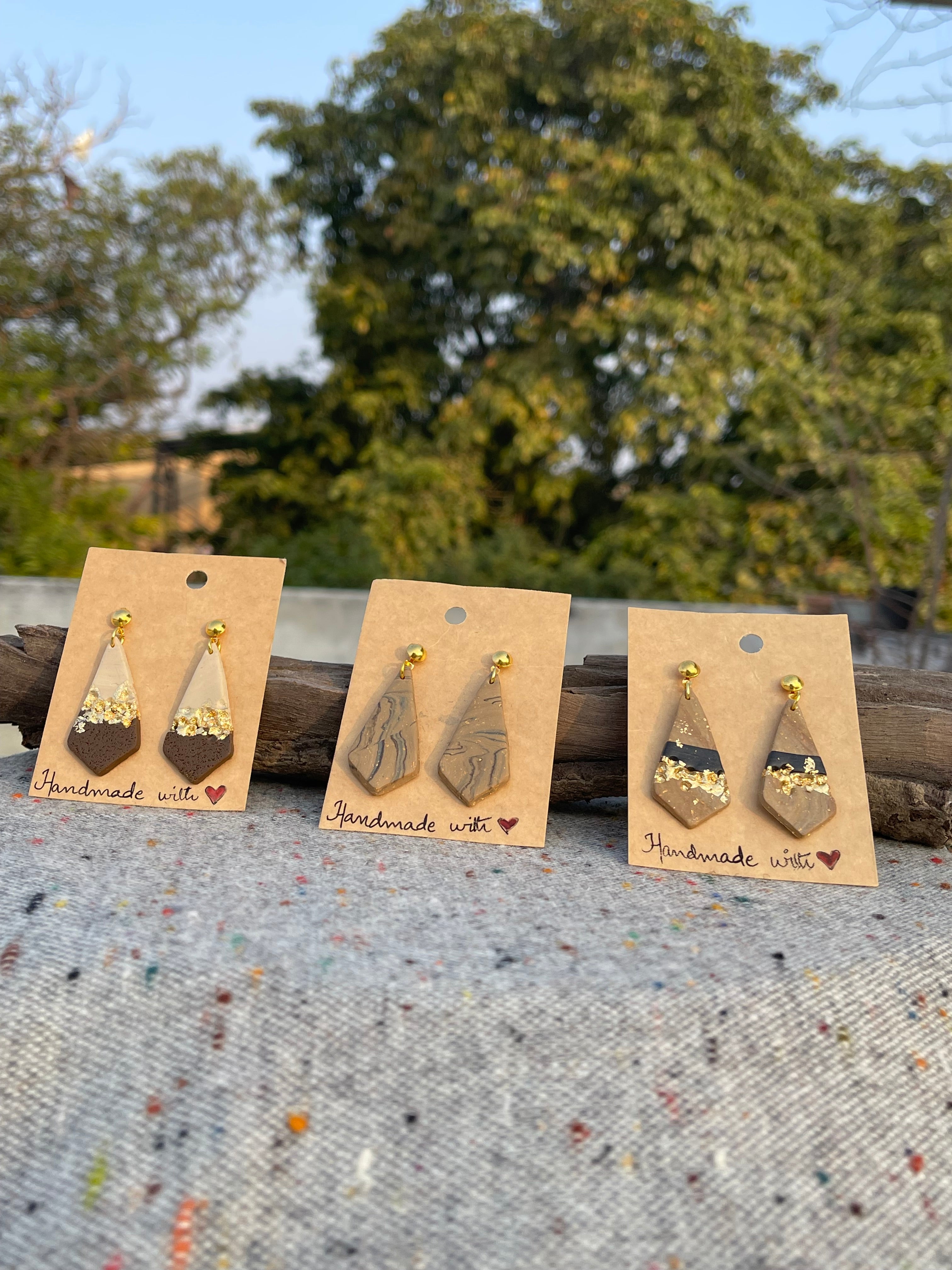 Tricon gold embedded earings - Clay Boutique