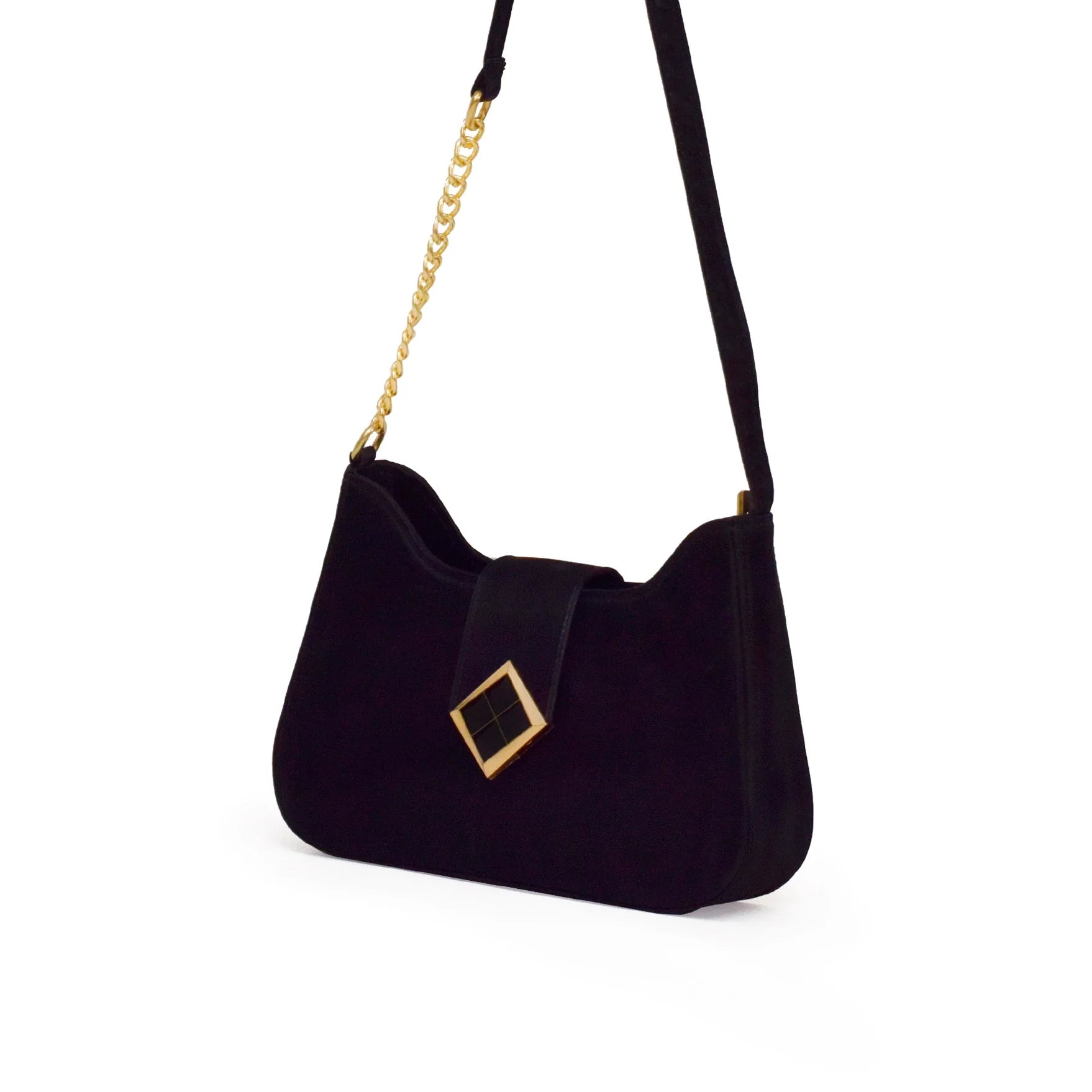 Black handbag with gold chain strap on a white background