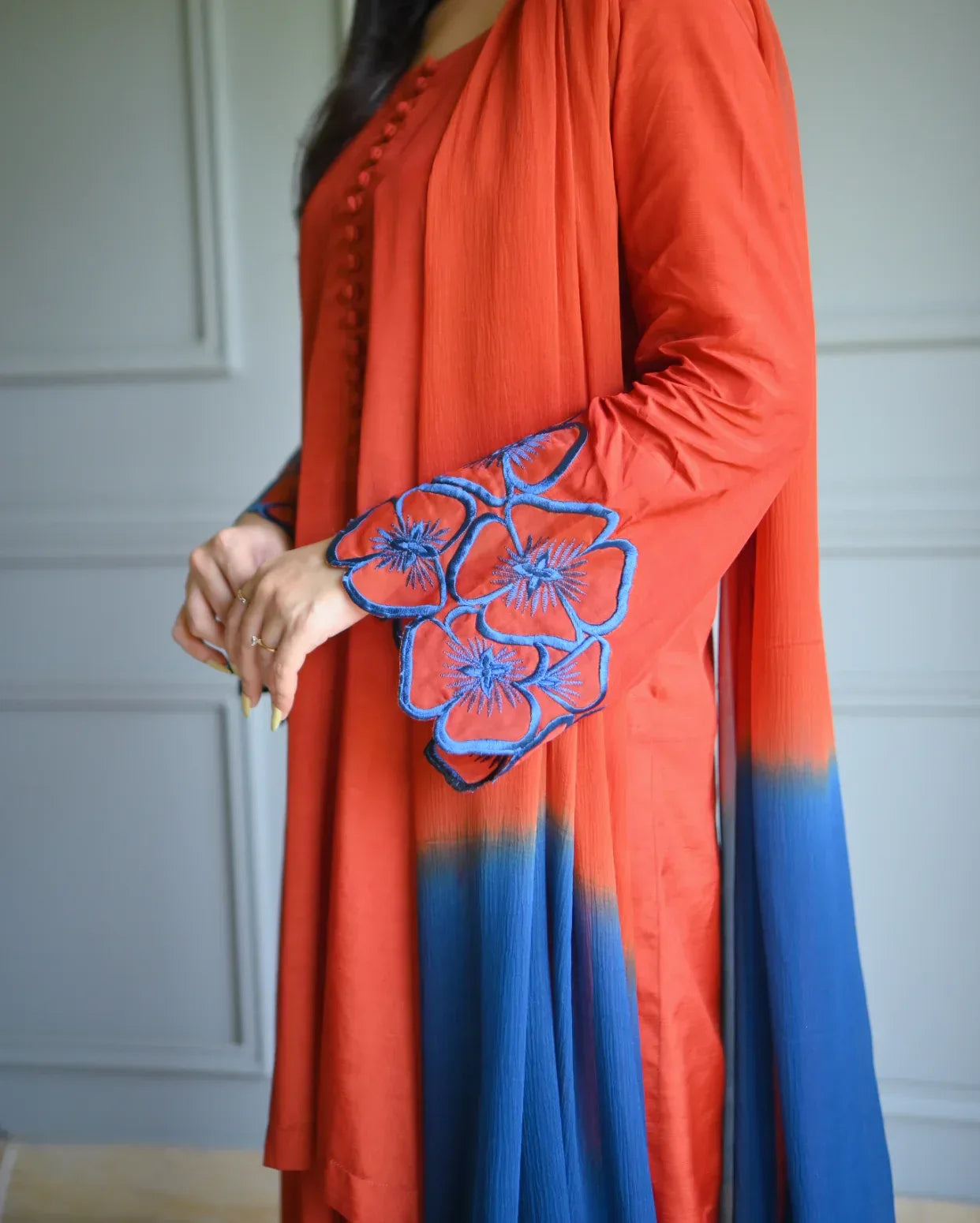 close up on the details of embroidery of sleeves.