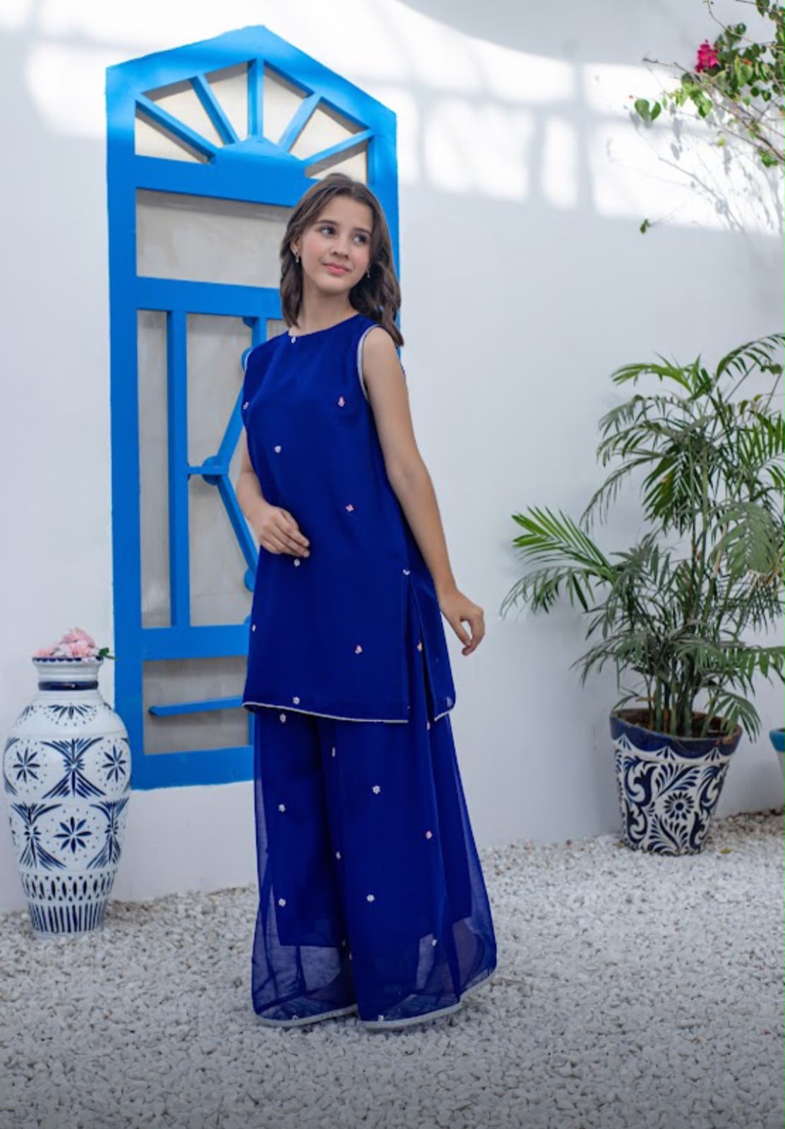 Electric Blue Chiffon Cordset
Sequins Embroidery on Shirt and Plazo
- Sania Khan